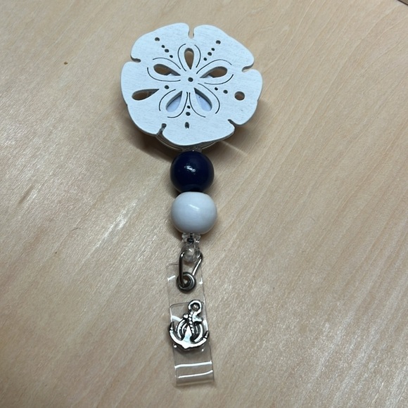 Sand Dollar Badge Reel - Picture 1 of 5